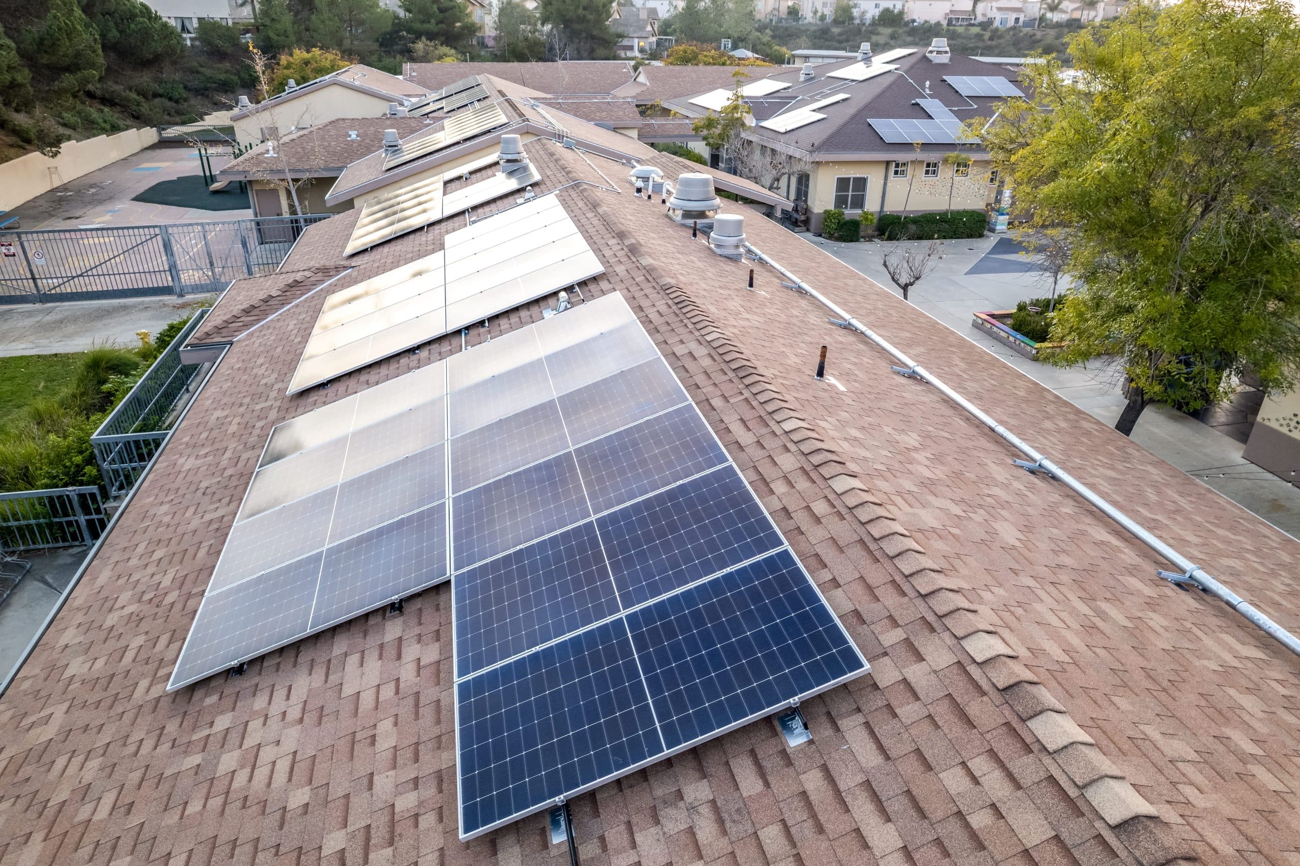 Residential solar panel installation on a Carlsbad, CA tile roof